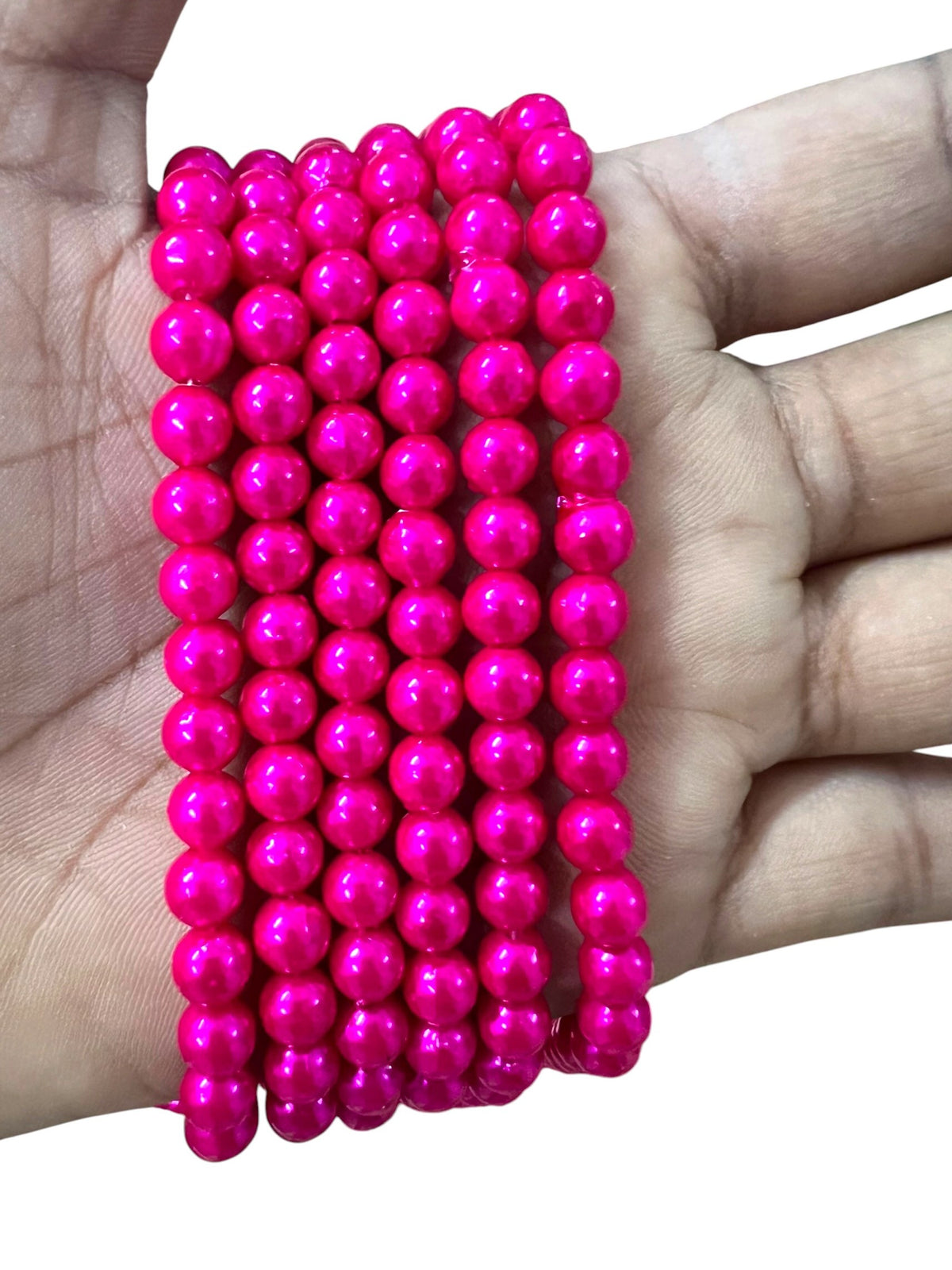 Vibrant dark pink 6mm moti beads with a smooth glossy finish, ideal for traditional Aari embroidery, fabric embellishment, and handmade jewelry making.