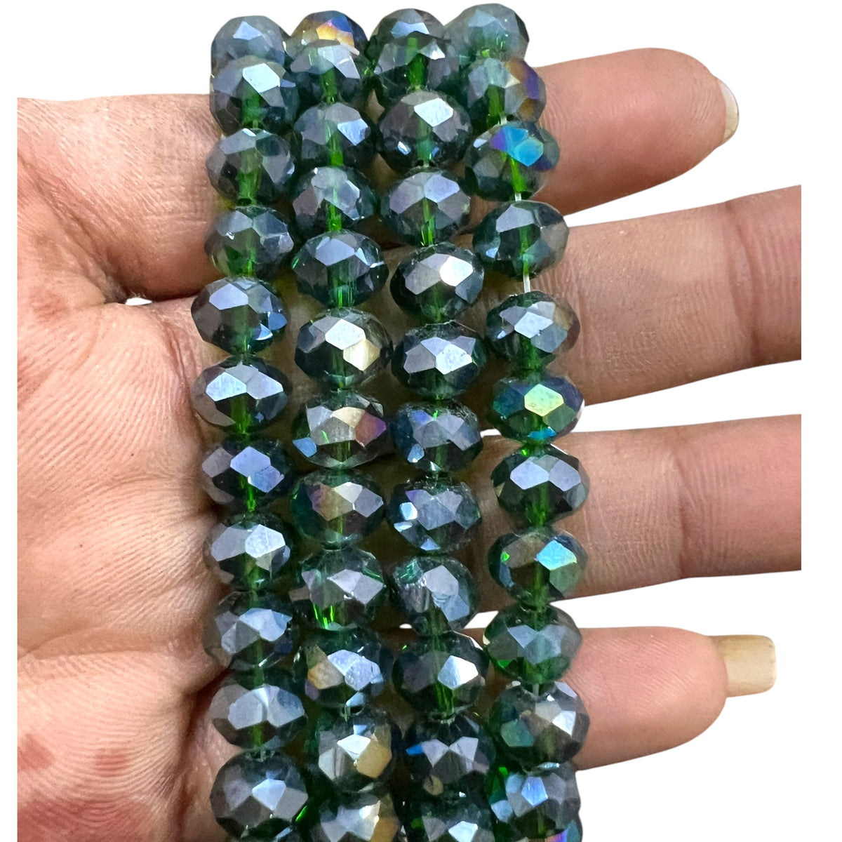Shop stunning 8mm emerald rainbow glass crystal round beads for jewellery making. Iridescent green finish perfect for DIY statement bracelets and crafts
