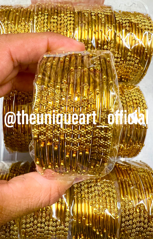 Flower Dotted Metal Bangle