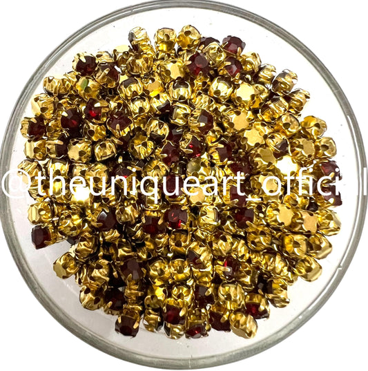 Maroon Small Round Clip Stones With Golden Base