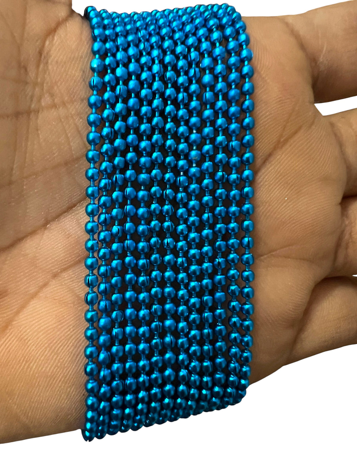 Shiny 2mm light blue ball chain close-up, perfect for delicate jewelry making, custom keychains, and artistic DIY craft projects.
