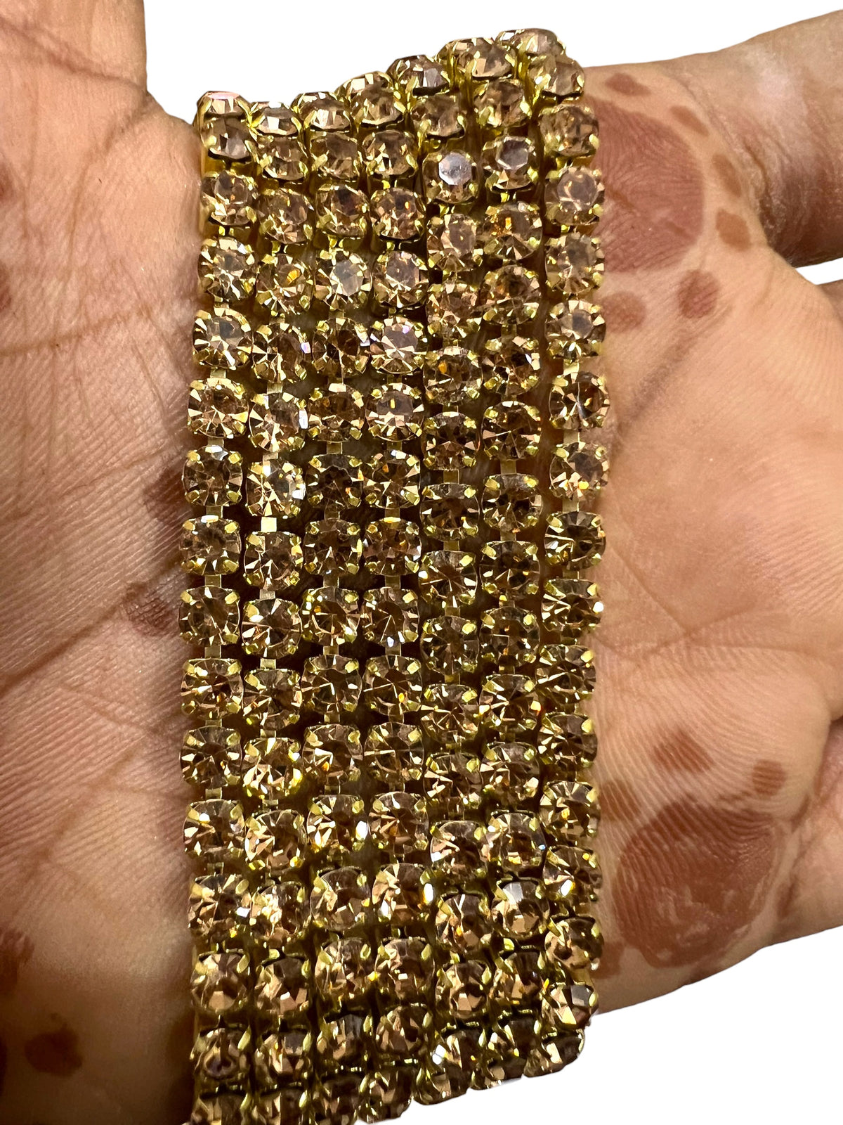 High-quality golden stone chain jewelry making supplies isolated on a white background