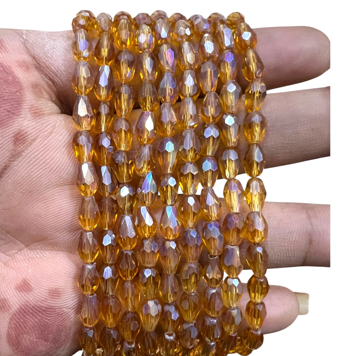 A full strand of shiny 4x6mm golden rainbow faceted glass crystal rondelle beads