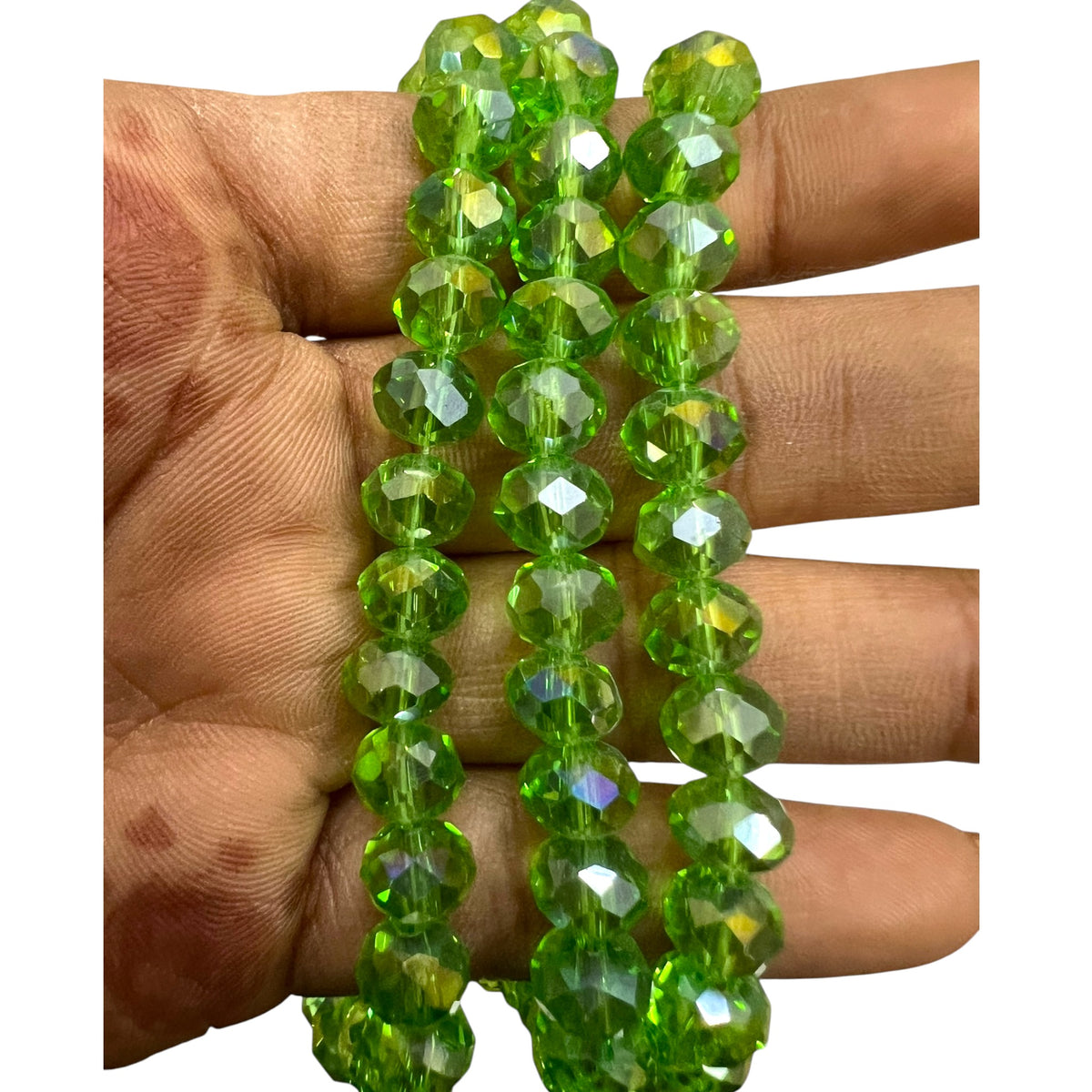 Shop stunning 8mm light green rainbow glass crystal round beads for jewellery making. Iridescent green finish perfect for DIY statement bracelets and crafts