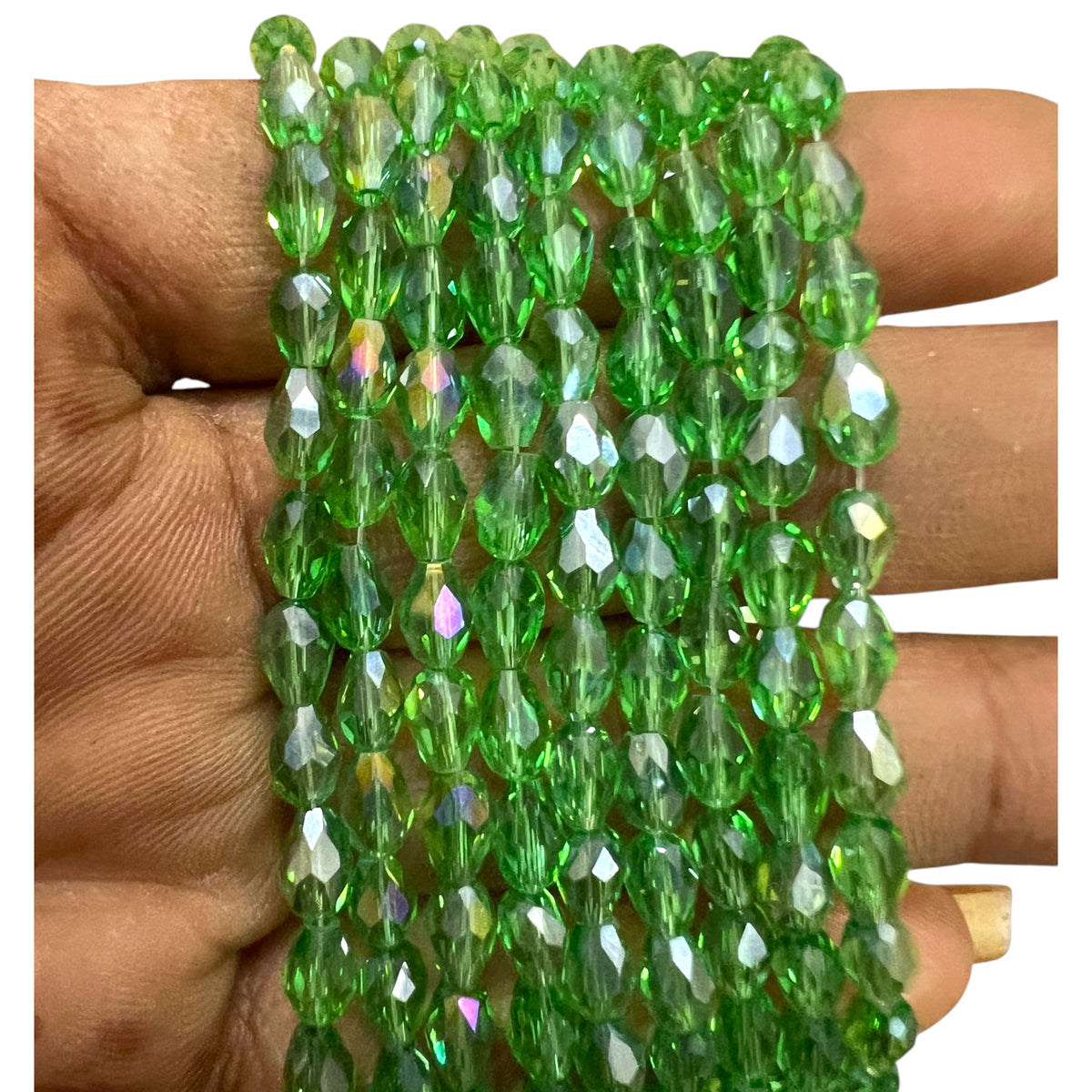 A full strand of shiny 4x6mm green rainbow faceted glass crystal rondelle beads