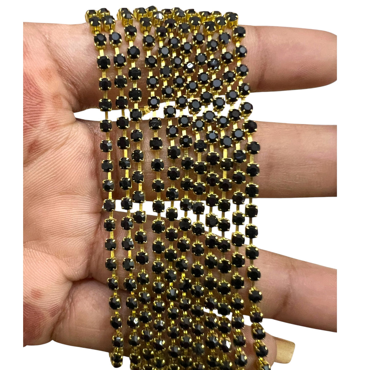 Shiny jet black stone rhinestone cup chain with a brass setting for jewellery designing