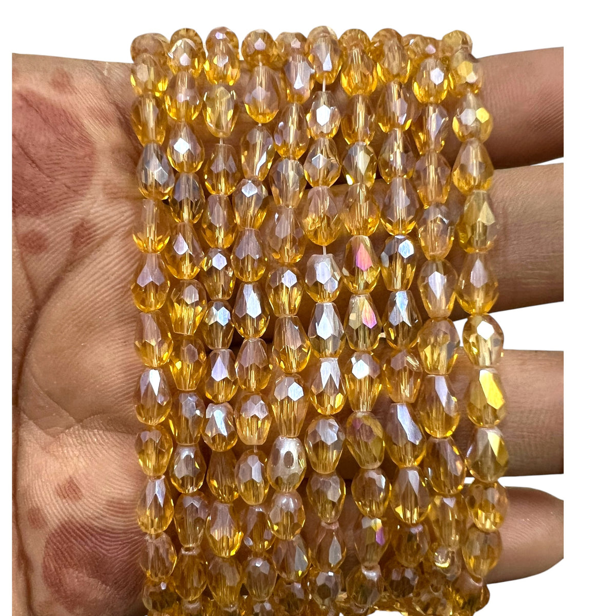 A full strand of shiny 4x6mm light golden rainbow faceted glass crystal rondelle beads