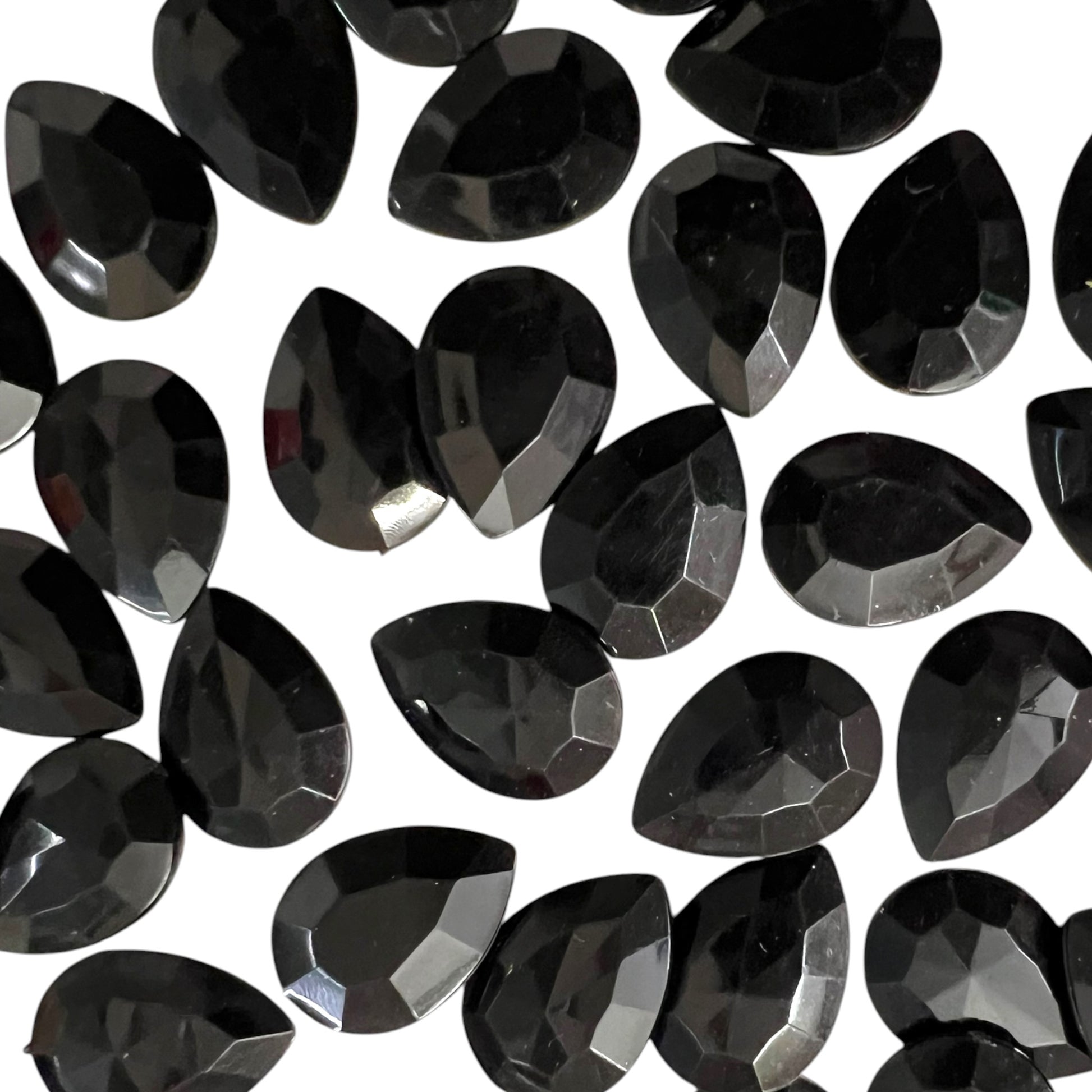 Pack of faceted black 10x14mm oval acrylic stone beads with shiny crystal-cut edges for jewelry making and craft projects