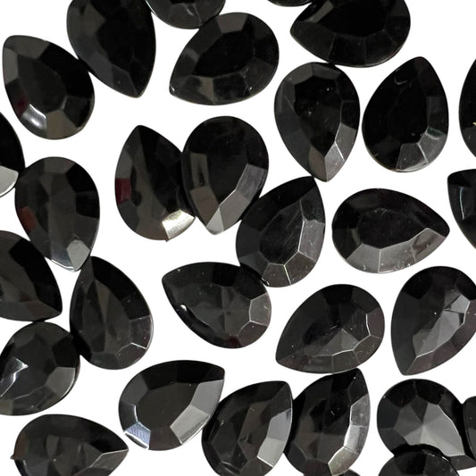 Pack of faceted black 13x18mm teardrop acrylic stone beads with shiny crystal-cut edges for jewelry making and craft projects
