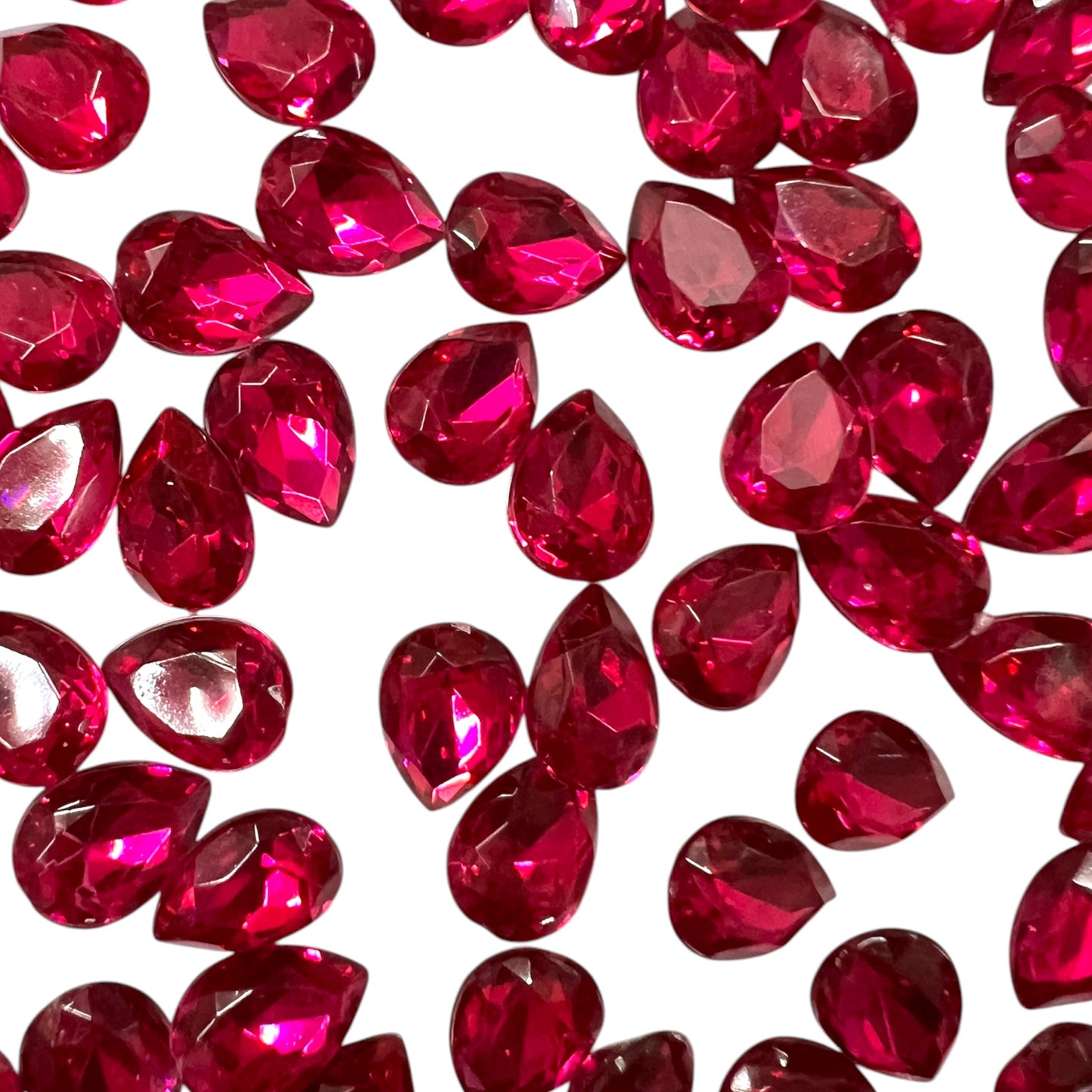 Pack of faceted dark rani pink 10x14mm oval acrylic stone beads with shiny crystal-cut edges for jewelry making and craft projects