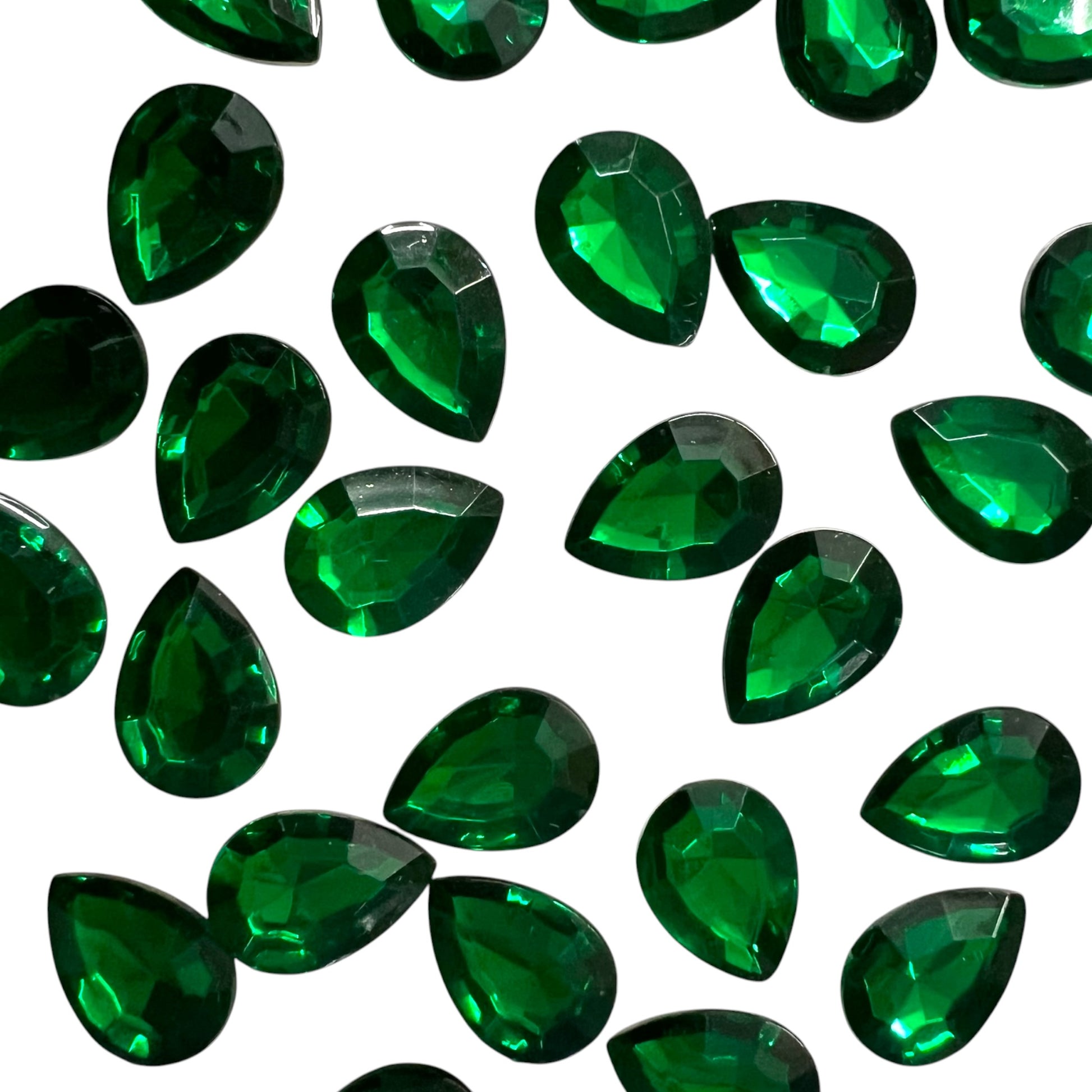 Pack of faceted green 10x14mm oval acrylic stone beads with shiny crystal-cut edges for jewelry making and craft projects