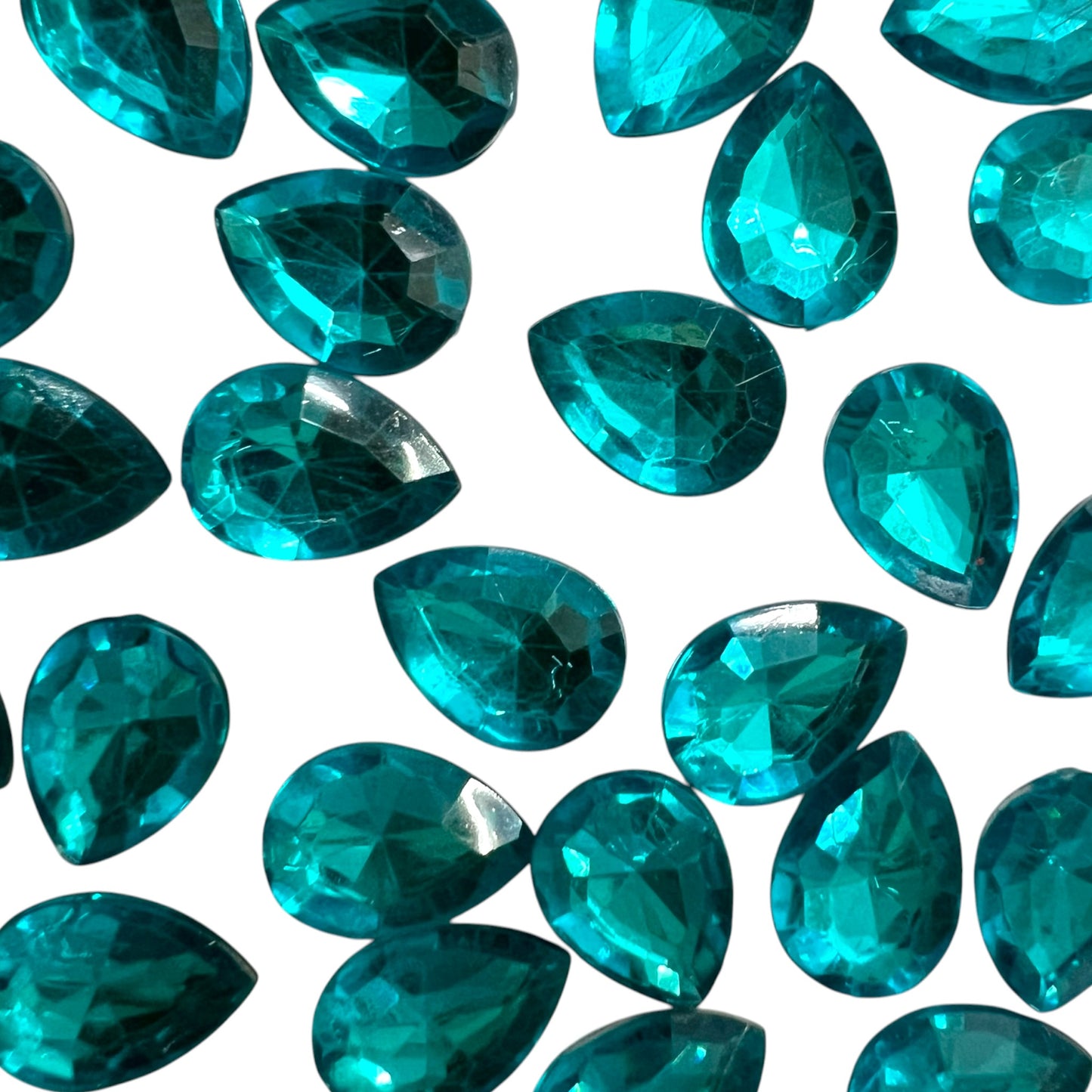 Pack of faceted light blue 10x14mm oval acrylic stone beads with shiny crystal-cut edges for jewelry making and craft projects