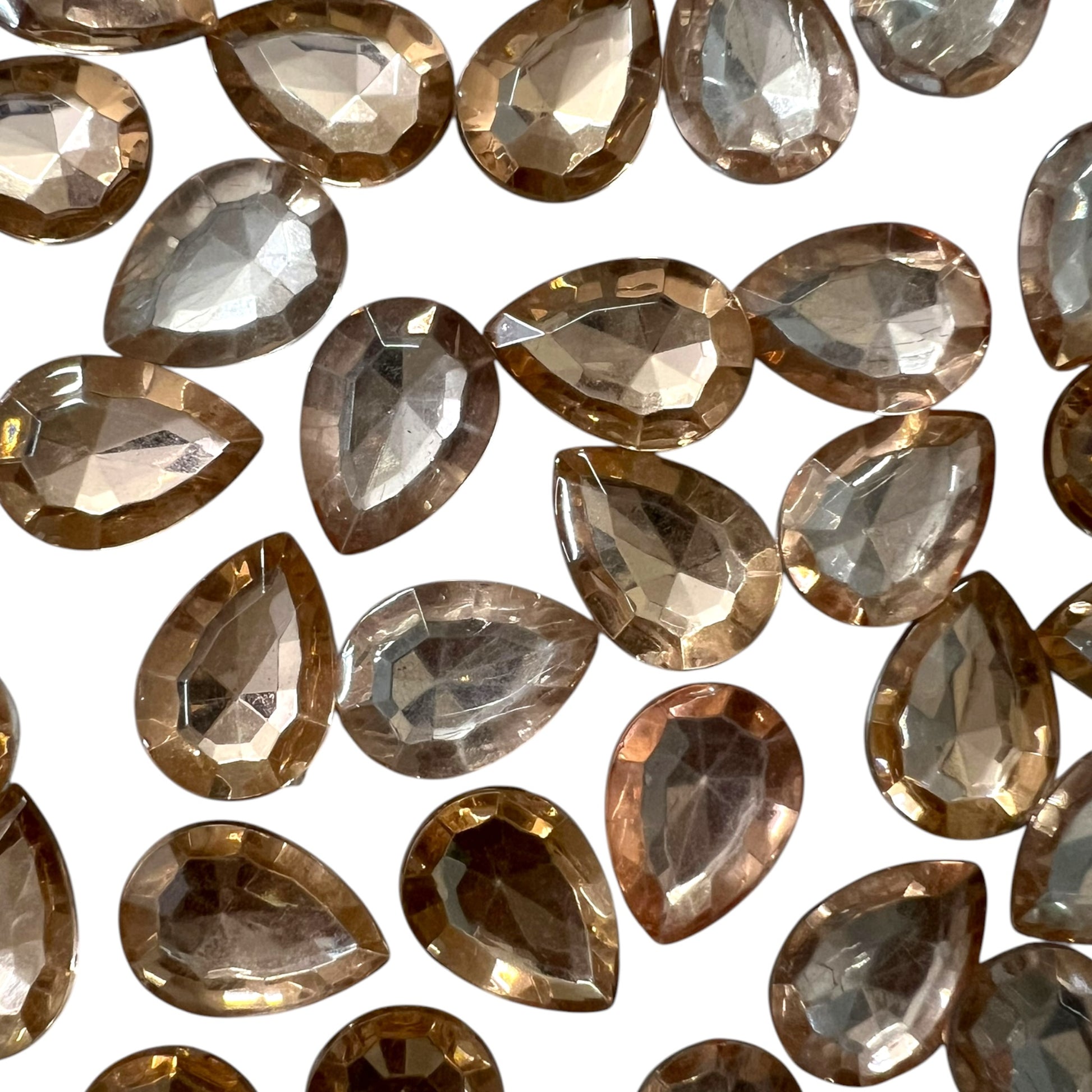 Pack of faceted peach 10x14mm oval acrylic stone beads with shiny crystal-cut edges for jewelry making and craft projects